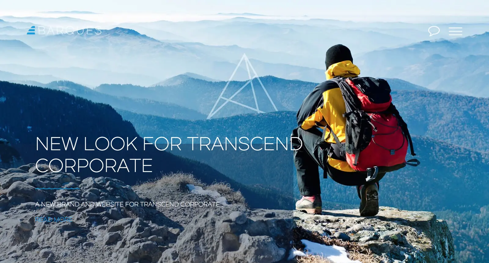 Mountain view with a person in a yellow jacket overlooking the landscape, promoting Barques’ new corporate branding.